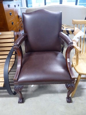 Lot 5292 - Leather effect armchair on ball and claw supports