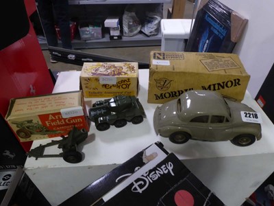 Lot 2218 - Three boxed vintage diecast figures. A...