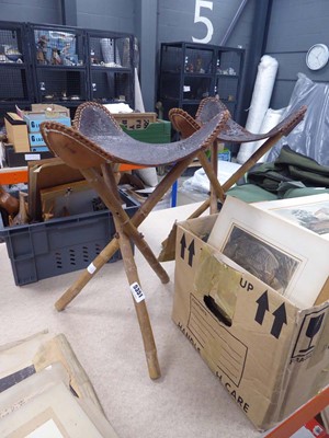 Lot 5351 - Pair of folding stools with leather seats