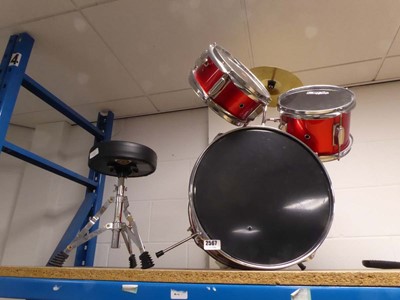 Lot 2567 - Child's drum set with stool