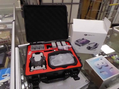 Lot 2491 - DJI Mini 4 Pro Drone along with accessories