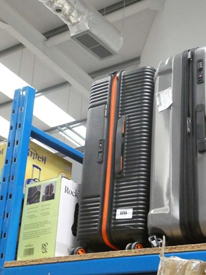 Lot 3255 - Hard shell Super Dry suitcase, plus The Rock...