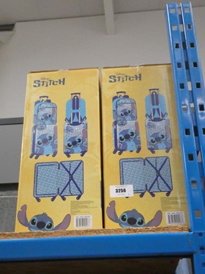 Lot 3256 - 2x Boxed Disney Stitch hard shell suitcases