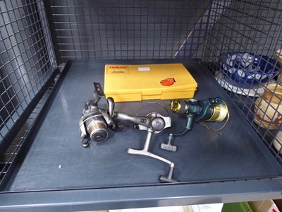 Lot 5413 - Cage containing spinning reels and lures, plus...