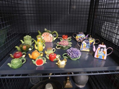 Lot 5474 - Cage containing novelty miniature teapots