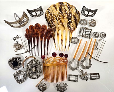 Lot 106 - A collection of decorative belt buckles,...