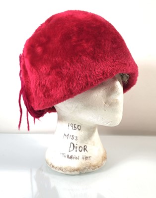 Lot 123 - A 1950's Miss Dior turban hat in pink, made in...