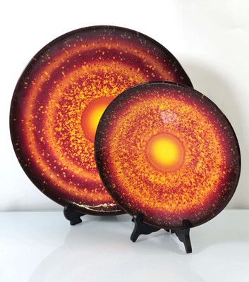 Lot 150 - A graduated pair of Poole Pottery 'Sun and...