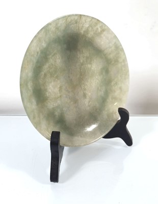 Lot 153 - A Chinese celadon jade bowl, di. 14.5 cm
