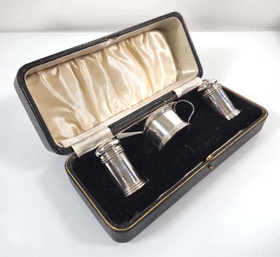 Lot 201 - A George V silver condiment set, Birmingham...