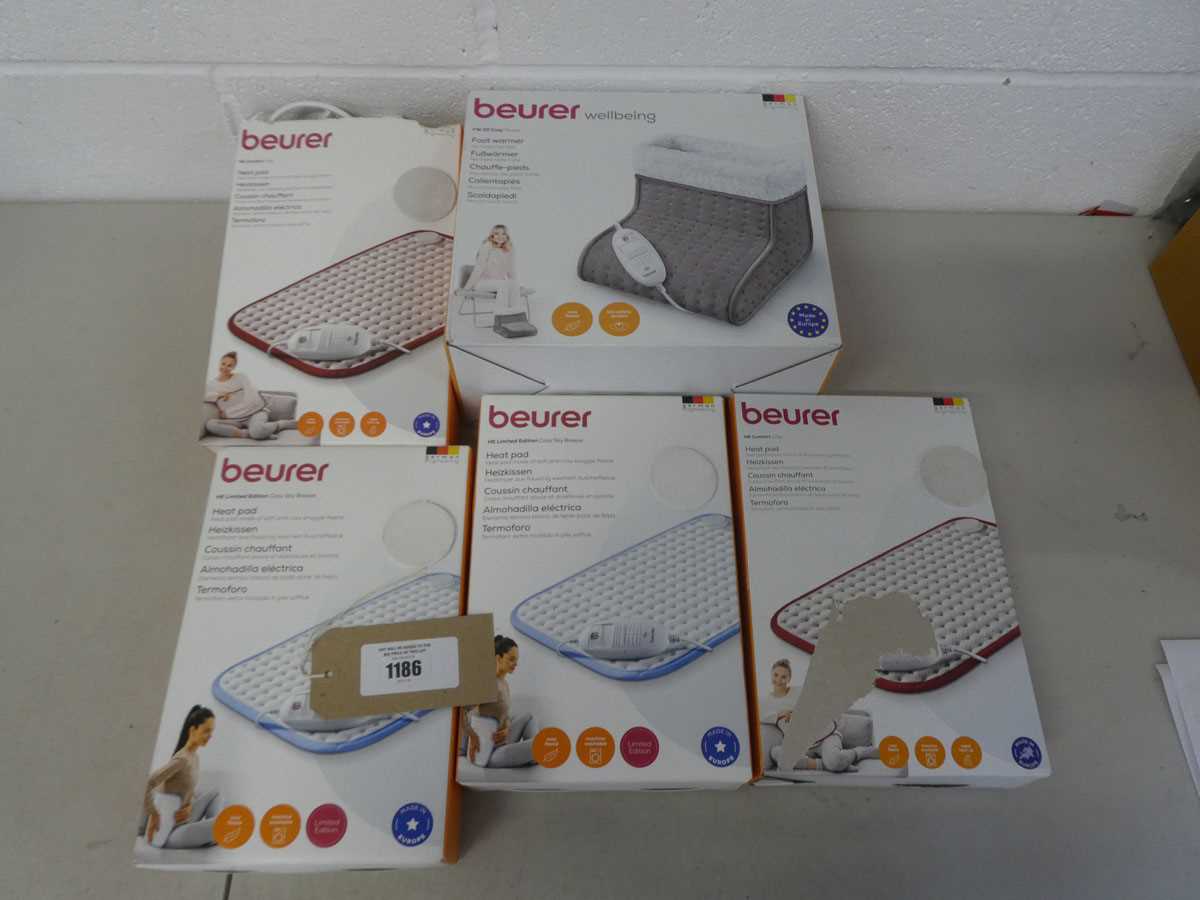 Lot A bag containing x4 Beurer heat pads and x1...