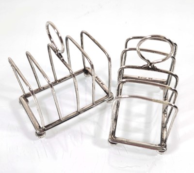 Lot 204 - A pair of Edwardian silver toast racks,...