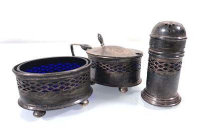 Lot 209 - A George V silver condiment set, Birmingham...