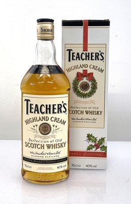 Lot 8 - An old bottle of Teacher's Highand Cream...