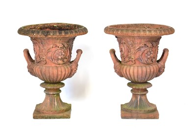 Lot 26 - A pair of terracotta planters of classical urn...
