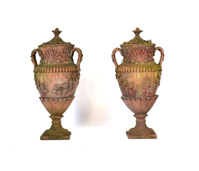 Lot 27 - A pair of terracotta covered planters on...