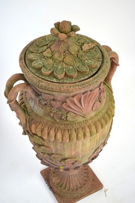 Lot 27 - A pair of terracotta covered planters on...