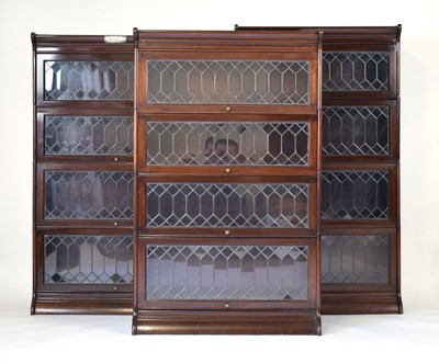 Lot 34 - A set of three Globe Wernicke style mahogany...