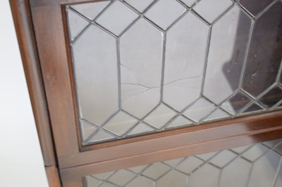 Lot 34 - A set of three Globe Wernicke style mahogany...