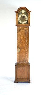 Lot 46 - A 20th century longcase clock, the brass face...