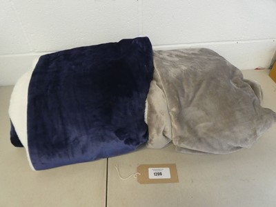 Lot A bag containing x2 Life Comfort throws.