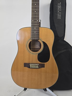 Lot An Encore twelve string acoustic guitar model...