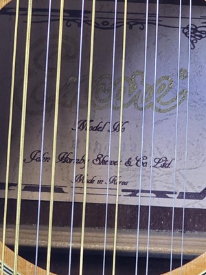 Lot An Encore twelve string acoustic guitar model...