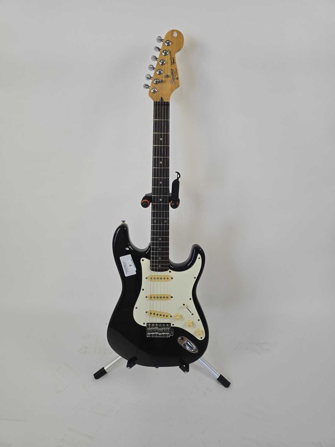 Lot A Korean black Fender Squier Stratocaster...
