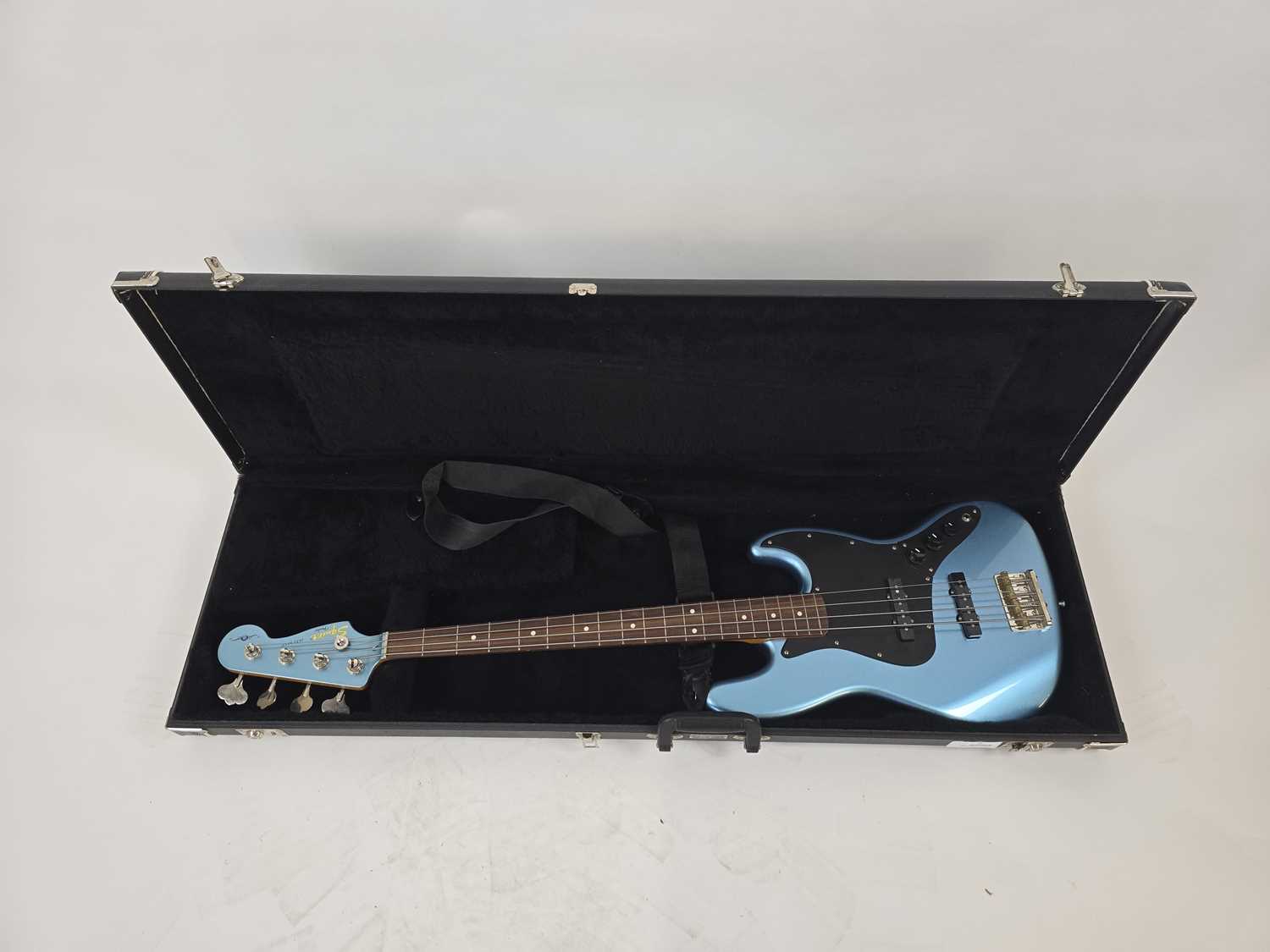 Lot A Chinese metallic blue Fender Squier jazz...