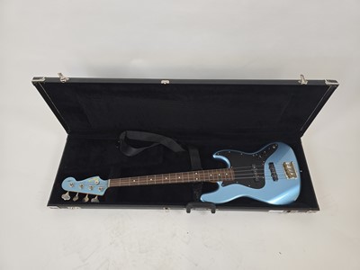 Lot A Chinese metallic blue Fender Squier jazz...