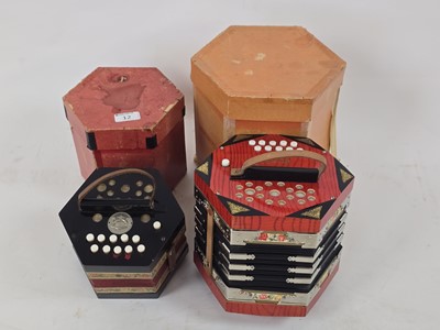 Lot A boxed Scholer twenty key concertina...