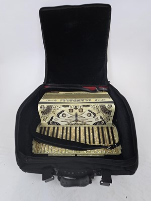 Lot A mother of pearl style cased Scandalli...