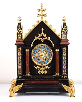 Lot 104 - A Victorian Gothic Revival table clock of...