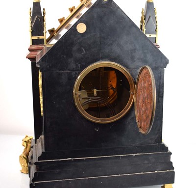 Lot 104 - A Victorian Gothic Revival table clock of...