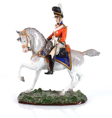 Lot 212 - A Sitzendorf military figure on horseback...