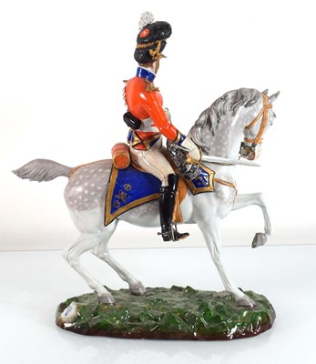 Lot 212 - A Sitzendorf military figure on horseback...