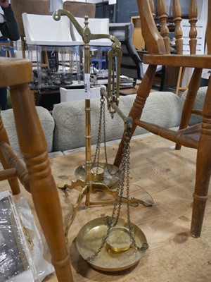 Lot 1521 - Brass set of balance scales with 2 weights