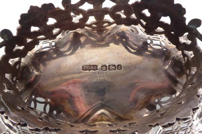 Lot 360 - A late Victorian silver basket with foliate...