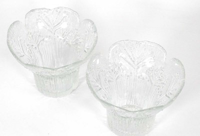 Lot 57 - A pair of moulded glass flower-head vases...