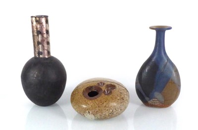 Lot 159 - A studio pottery pebble vase with incised LS...