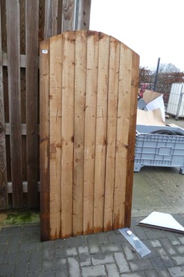 Lot 2395 - Wooden feather edged arch top garden gate...