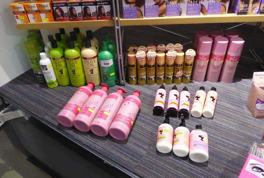 Lot 3355 - Hair products to the left side of cabinet,...