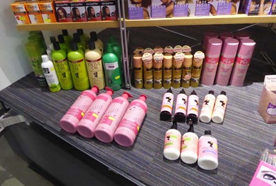 Lot 3355 - Hair products to the left side of cabinet,...