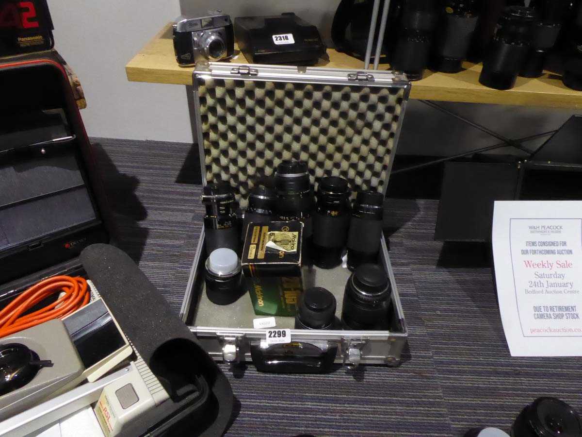 Lot 2299 - Set of 9 camera lenses in case