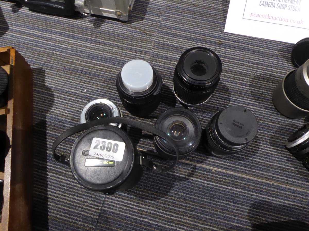 Lot 2300 - Selection of 7 unboxed camera lenses