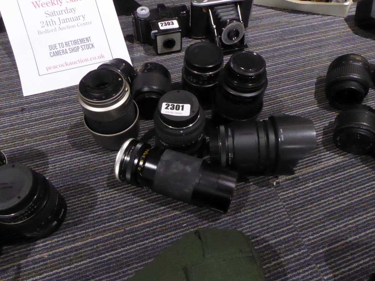 Lot 2301 - Selection of 7 unboxed camera lenses