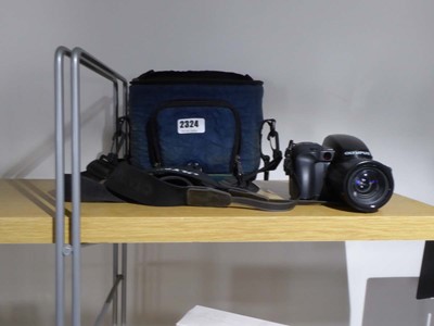 Lot 2324 - Olympus IS100 camera along with camera bag