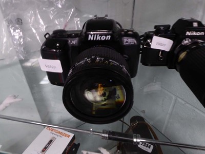 Lot 2333 - Two Nikon cameras- a F601 and an EMM90 with a...