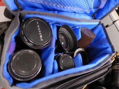 Lot 2537 - 2 camera bags containing various camera lenses
