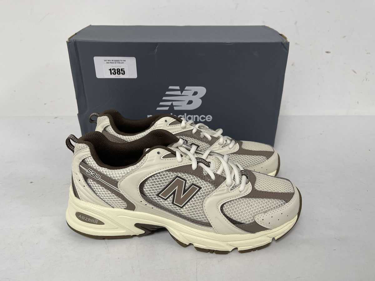 Lot 1385 - New Balance 530 trainers in cream size UK8 -...